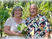 bride and groom married hawaiian flower boquet
